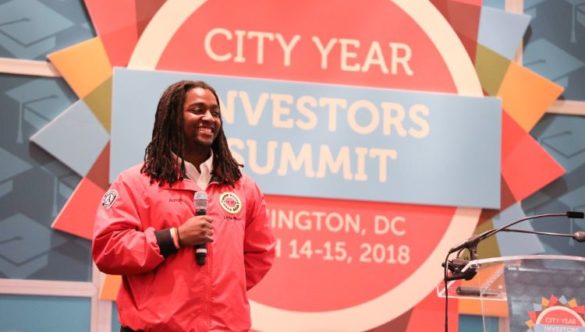 City Year AmeriCorps member speaking at event
