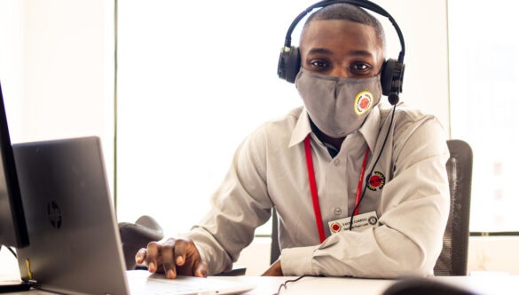City Year AmeriCorps in school service with mask